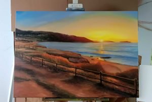Puesta de sol en playa a la izquierda